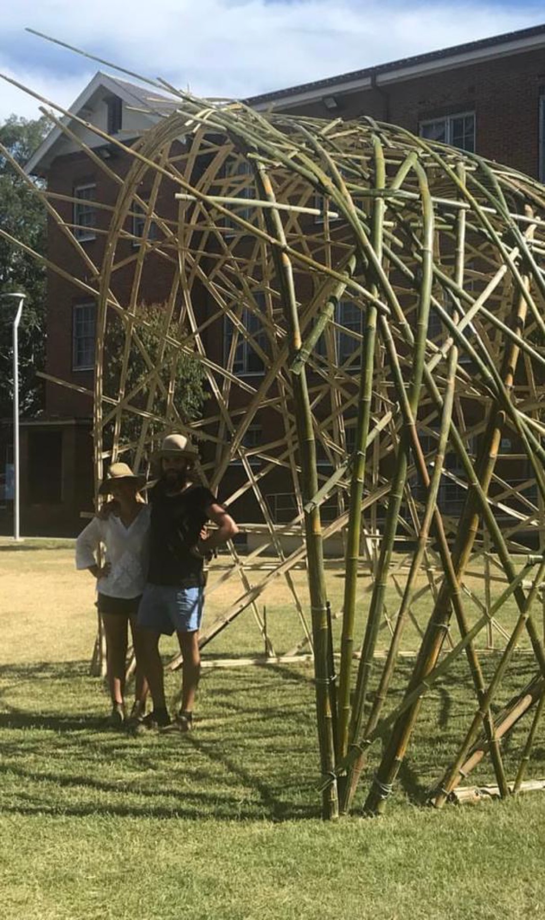 Woven — structure with artists for scale